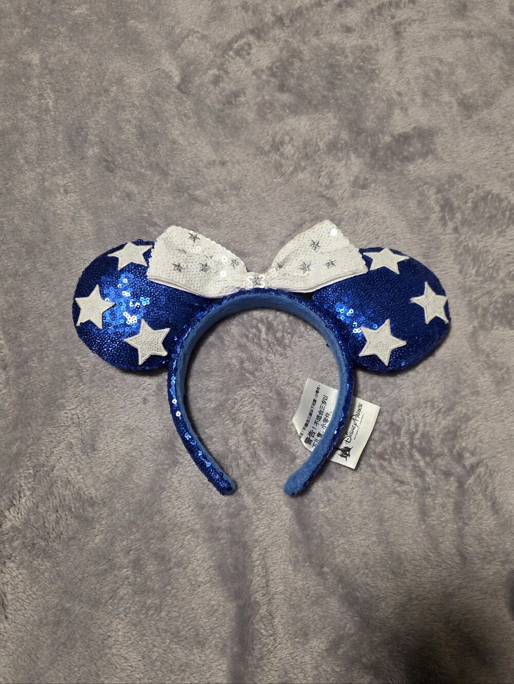Disney Blue Sequin Star Women's Ear Headband with White Bow